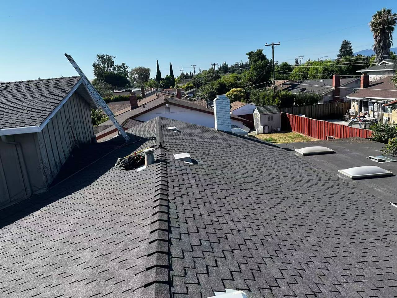 Completed dark asphalt shingle roof in San Jose