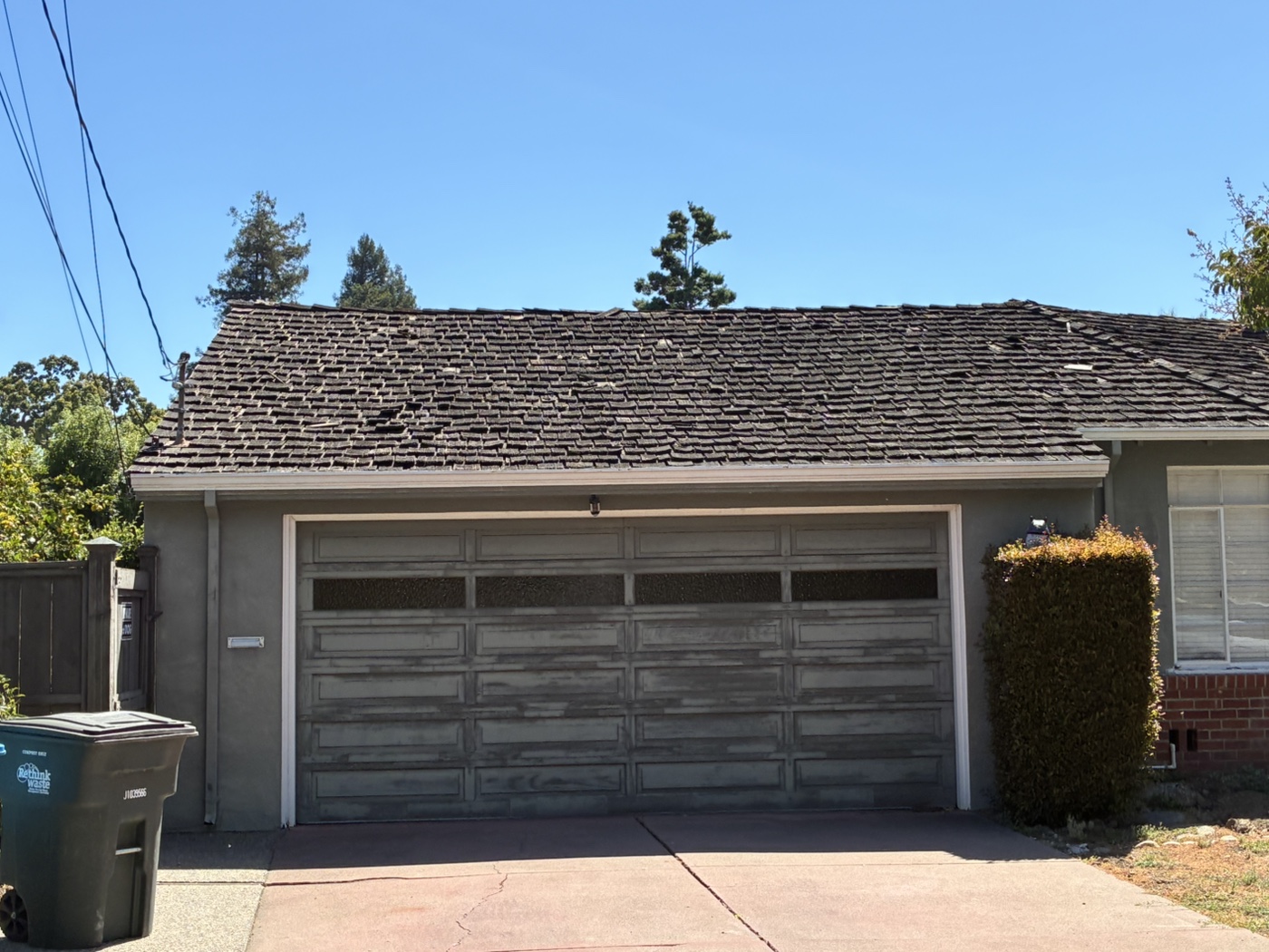 Worn roof before replacement at 1645 Elm Street in San Carlos